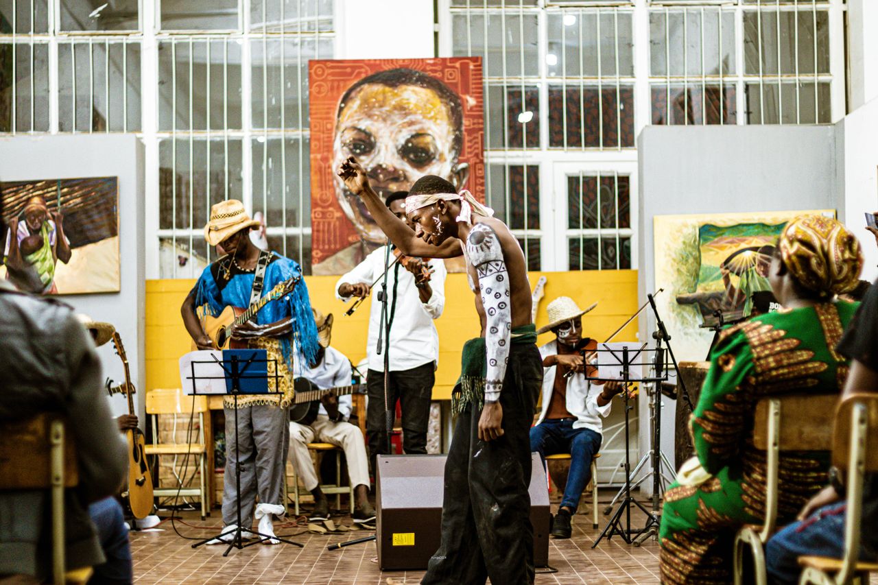 services-02 Energetic African cultural performance featuring live musicians and traditional dancers.